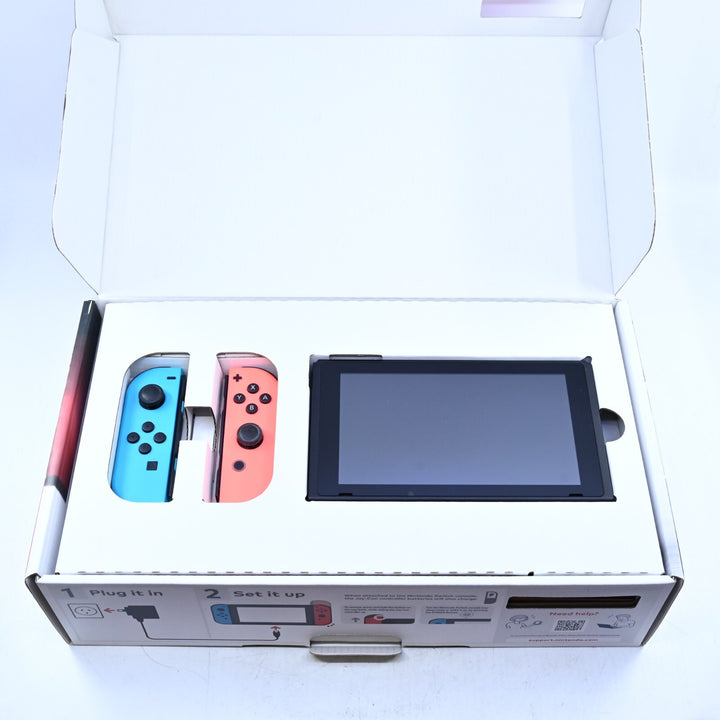 Blue / Red XKW700311 - Nintendo Switch Boxed Console - PAL - FREE POST!