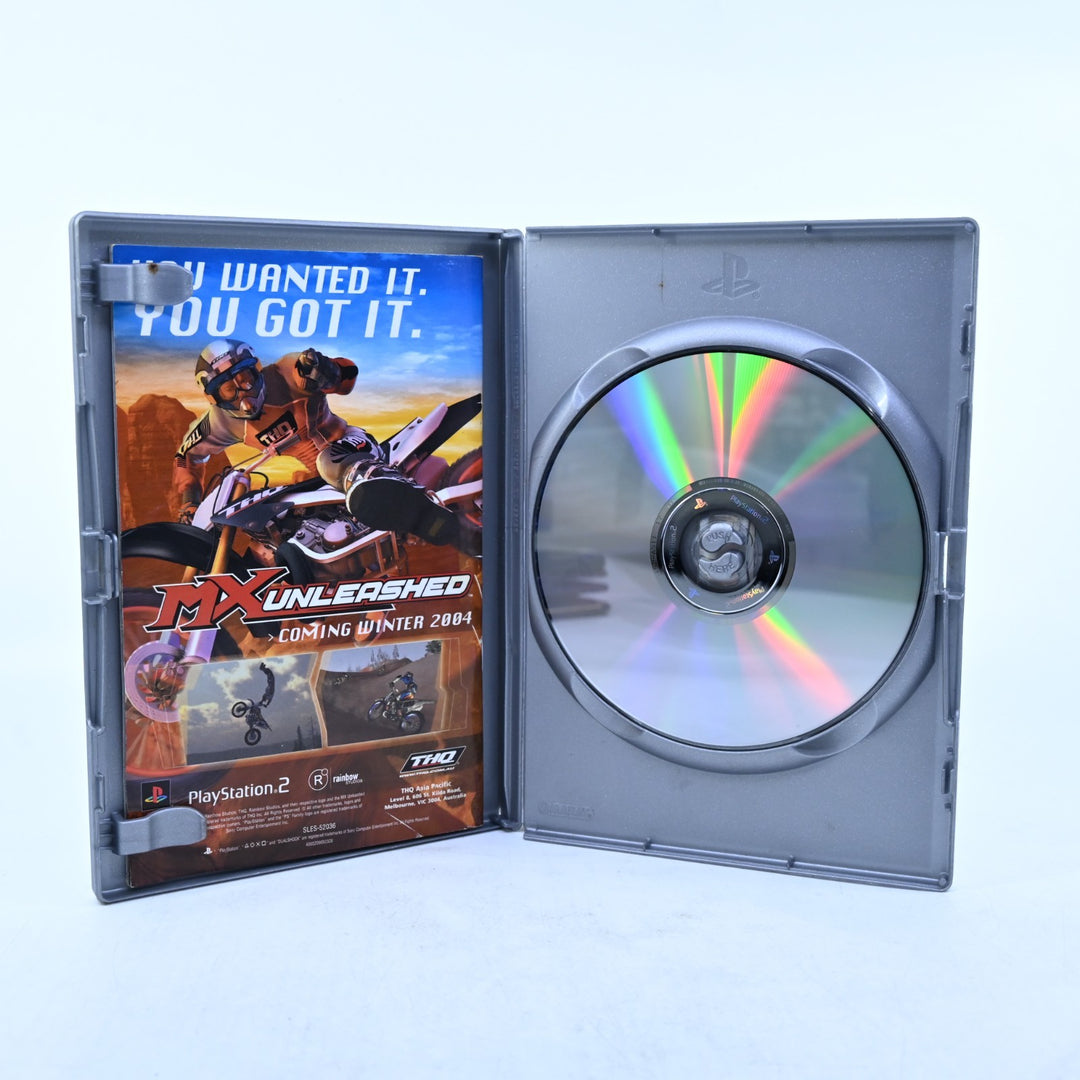 WWE SmackDown!: Here Comes the Pain - Sony Playstation 2 / PS2 Game + Manual