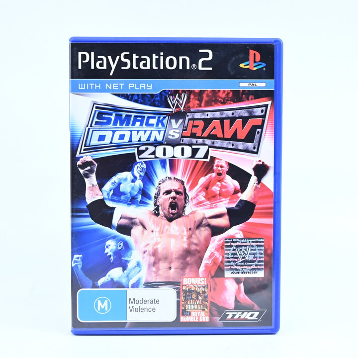 WWE SmackDown! vs RAW 2007 - PS2 Game + Manual + Royal Rumble DVD - PAL