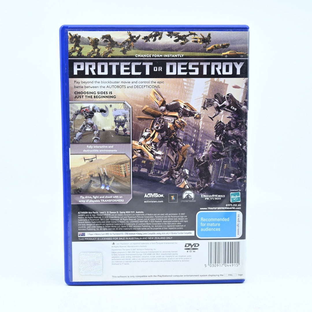 Transformers The Game- Sony Playstation 2 / PS2 Game + Manual - NEAR MINT DISC!