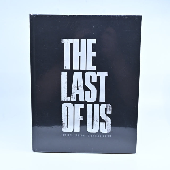 SEALED! The Last of Us Limited Edition Strategy Guide + Keychain - Brady Games
