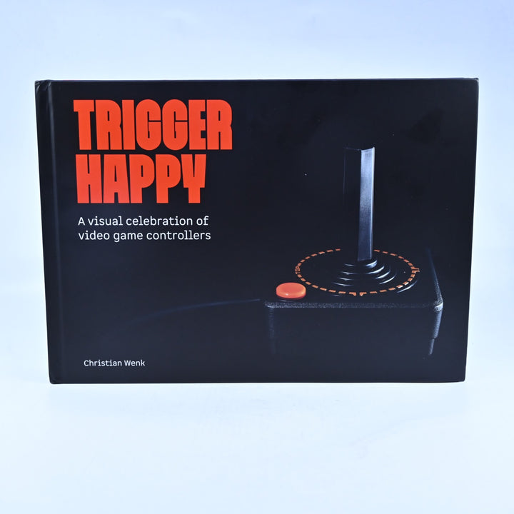 Trigger Happy: A Visual Celebration of Video Game Controllers - C. Wenk - Book