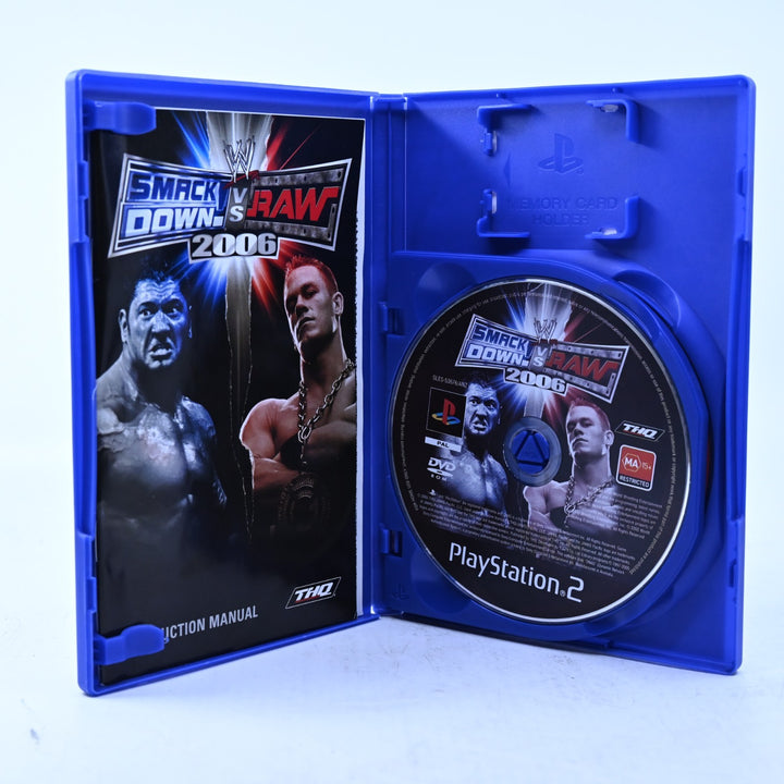 WWE SmackDown! Vs. Raw 2006 - PS2 Game + Manual + Royal Rumble DVD - PAL